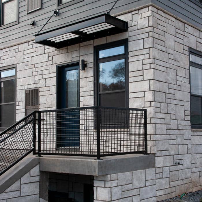 Modern porch featuring Yorkshire neutral tone exterior stone veneer