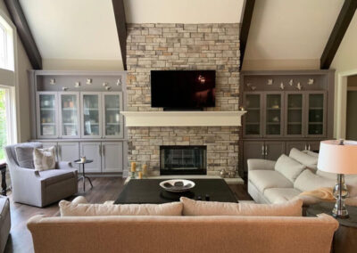 A living room featuring a fireplace made from Casa di Sassi's Cremona EZledge profile.