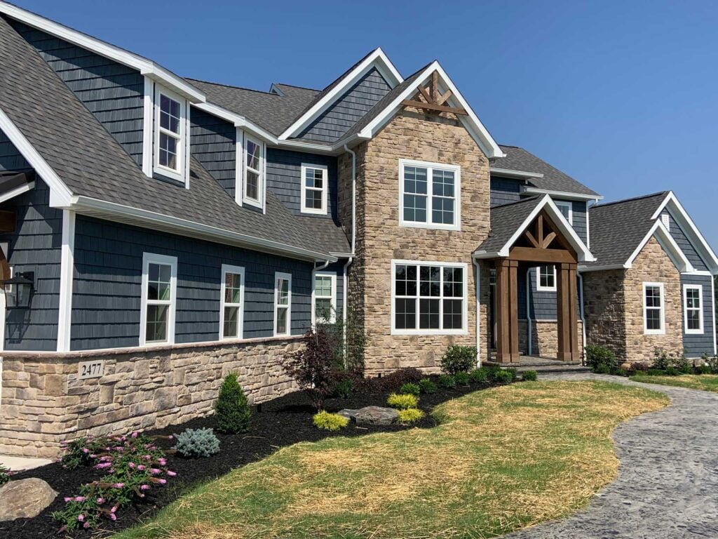 a home exterior featuring Casa di Sassi's Terracina Blend.