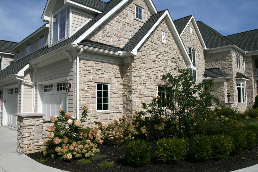 A home exterior featuring Bianco Blend