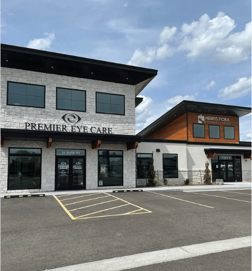 Exterior photo of an eye care clinic with grey stone walls
